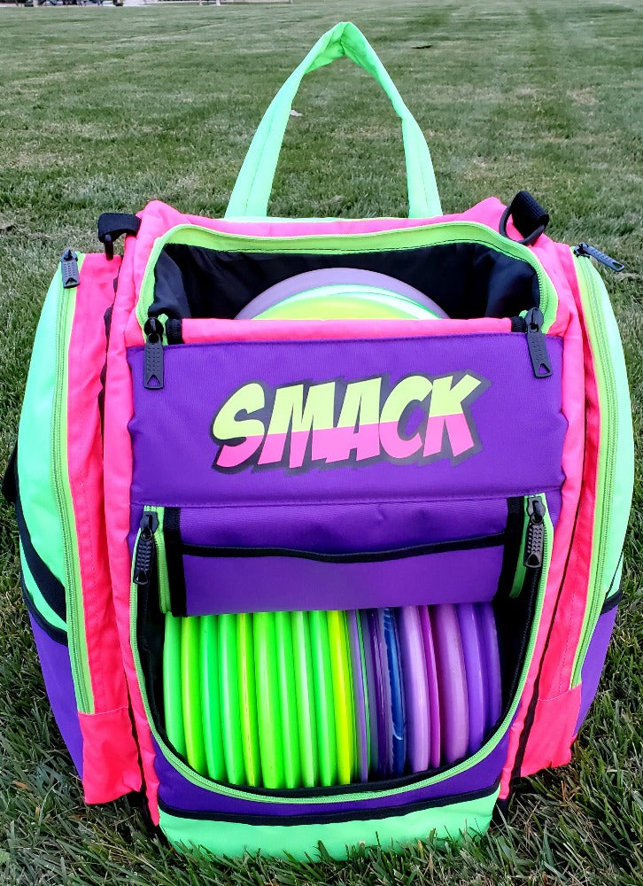 purple and green disc golf backpack